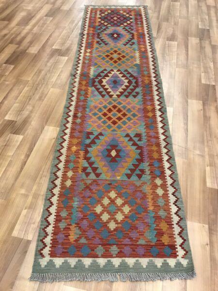 Lovely rug with turquoise flashes