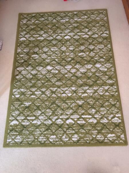 GREEN RUG. AS NEW CONDITION
