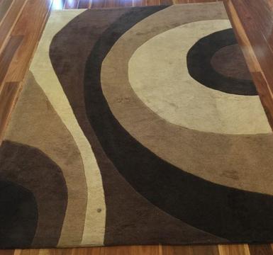Two acrylic rugs