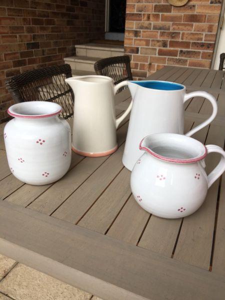 Three jugs and one vase
