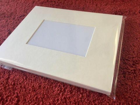 Bevel cut photo & picture mounts with backing board protective