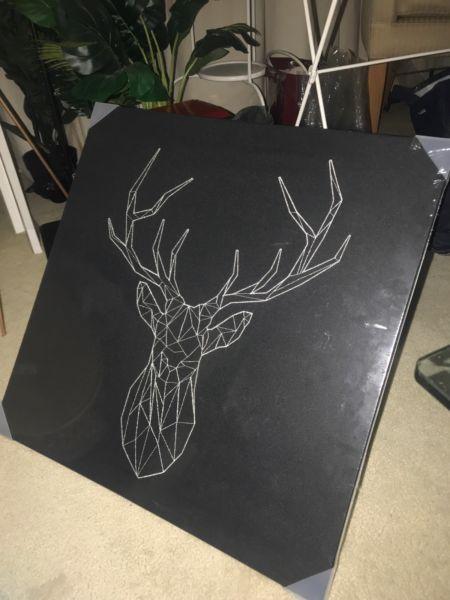 Deer canvas print with gold thread stitches
