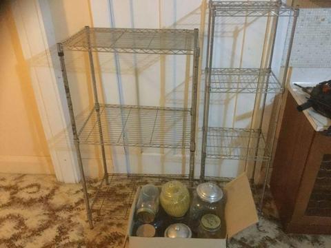 2 steel racks and box of glass jars