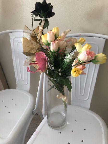 Vase with artificial flowers