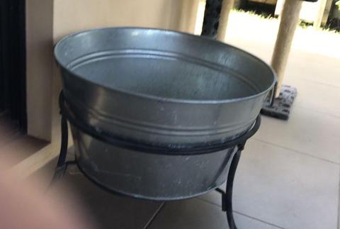 Metal round galvanised bucket on iron stand, ice bucket, garden pot
