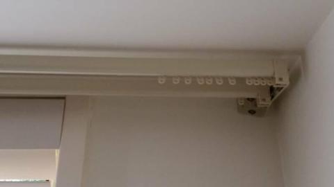 TWO CURTAIN RODS