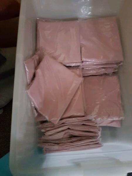 80 x pink chair covers brand new!!