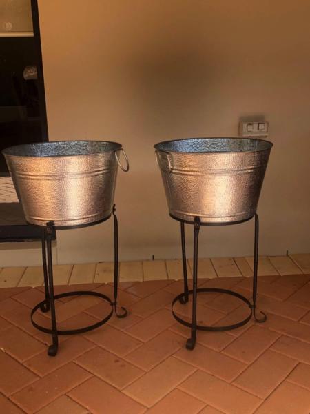 Pair of Metal ice buckets on stands