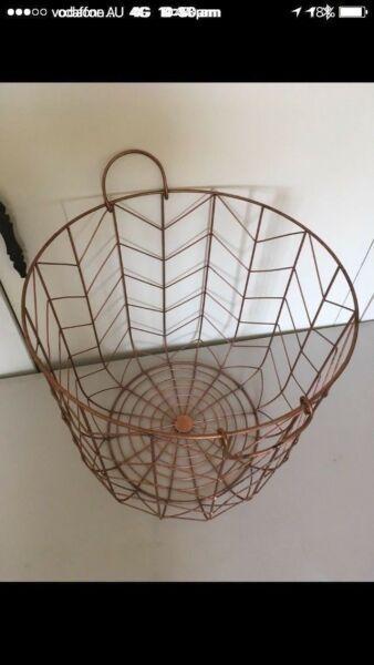 Beautiful copper type wire basket clothes