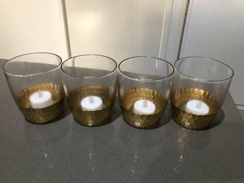 4 x gold painted glass jars with tea light candles