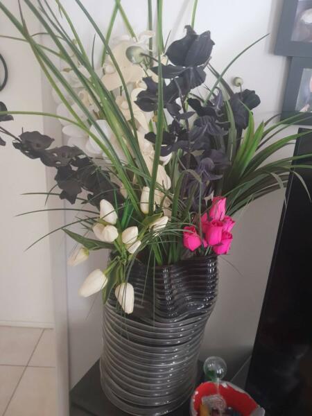 Funky vase with artificial flowers