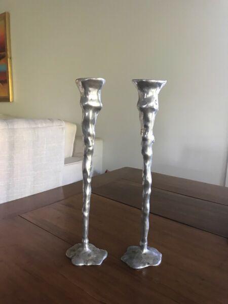 Pair of handmade metal candlesticks