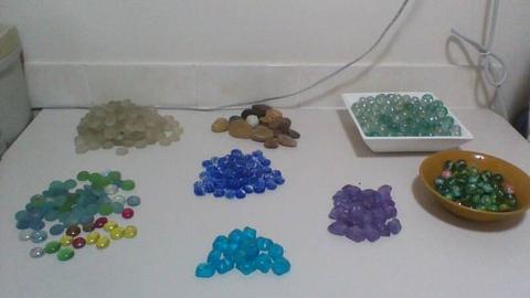 Lots of coloured and plain glass balls, marbles and water beads