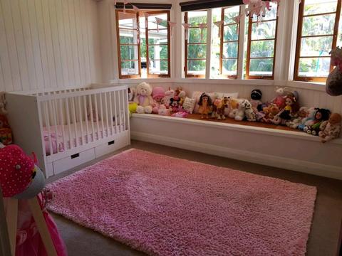 Large pink shaggy rug