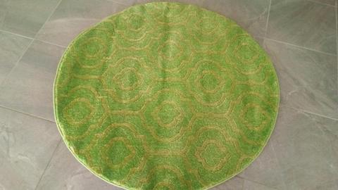 Green round rug