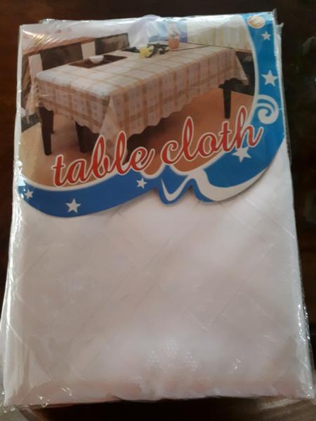 Brand new table cloths x 8