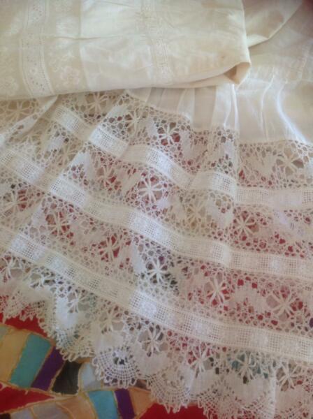 LACE - delicately patterned cream coloured (on calico petticoats)