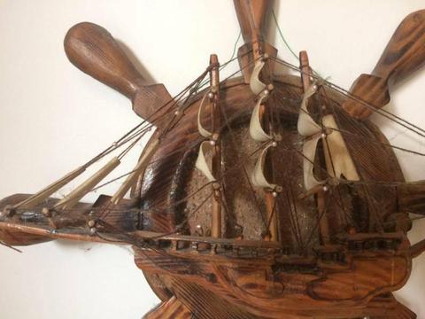 Boat wheel and sailing ship wall ornament
