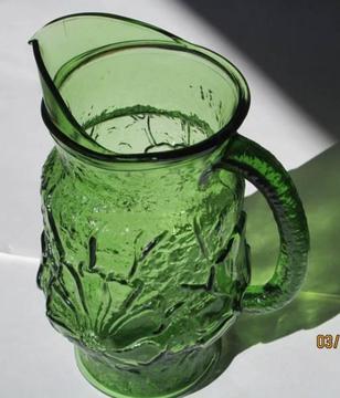 LARGE GREEN PRESS MOULDED GLASS WATER JUG, FLORAL DESIGN