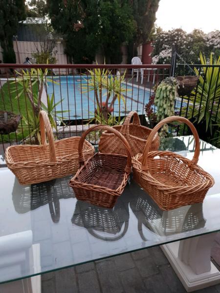 GROUP OF CANE BASKETS