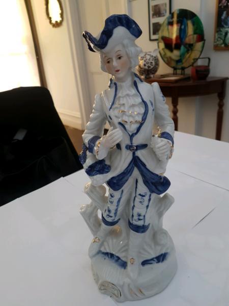 Blue and white ceramic figurine