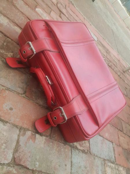 Red vintage suitcase