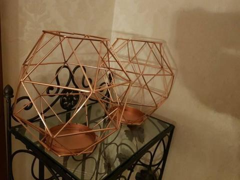 2× rose gold candle holders