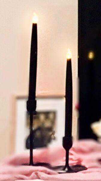 Battery operated black tapered candles