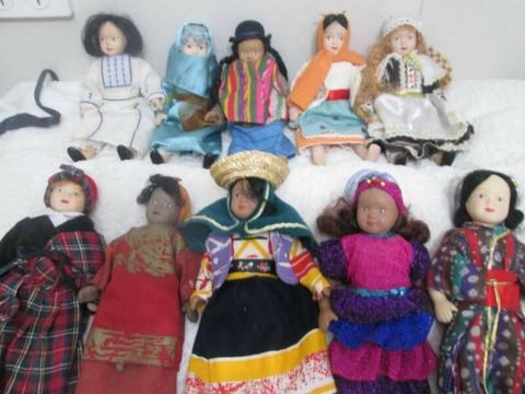 porcelian dolls around the world . 22cm tall