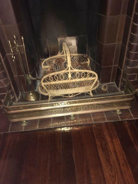 Brass Fireplace Fender with fire tools and old wood basket