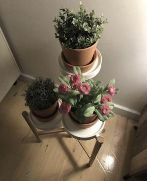 Plant stand with artificial plants