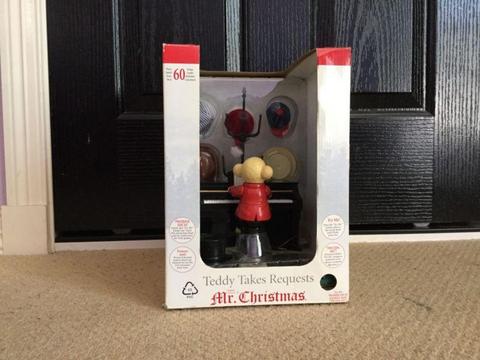 Mr. Christmas teddy takes requests in box