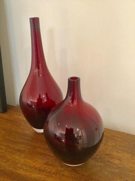 Red glass bottles/vases