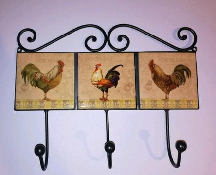 Triple hook wall hanger with decorative tiles