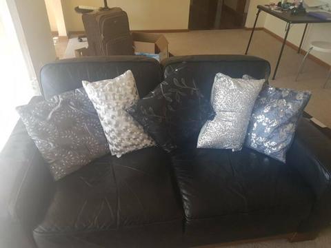 Black and silver sequined cushions