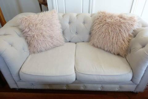 2 x faux fur cushions in blush