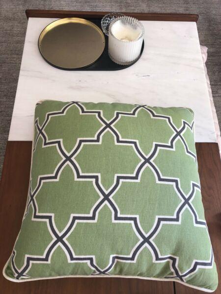 Stylish green geo patterned cushions