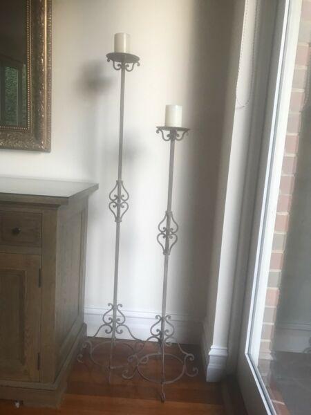 Two wrought iron candelabras