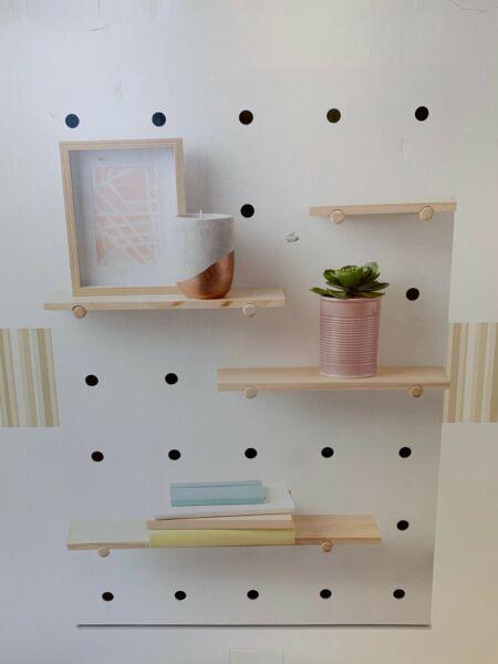 Pegboard with wood shelves