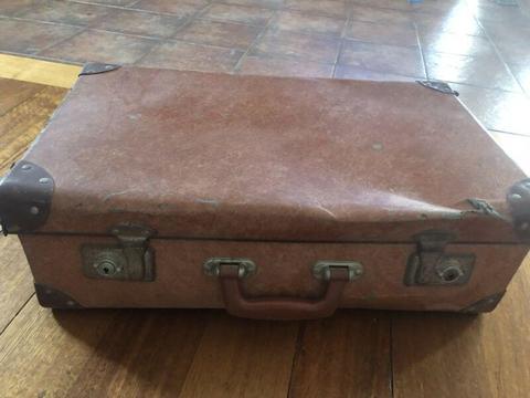 Vintage suitcase and clock
