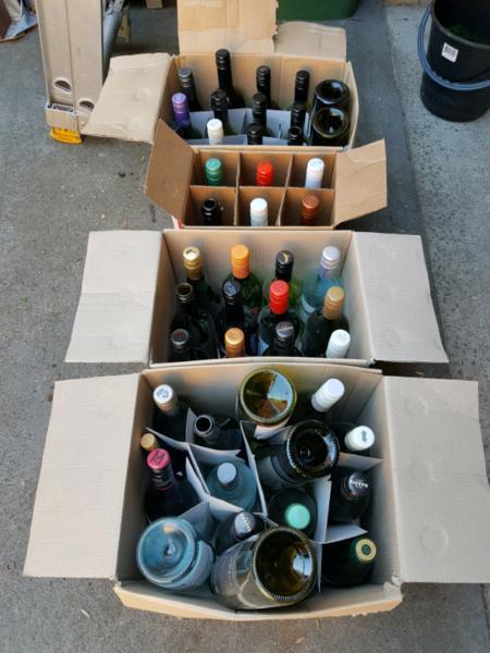 Approximately 50 EMPTY wine bottles