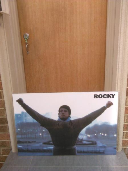 Rocky movie poster on a timber board