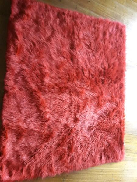 Faux fur throw rug