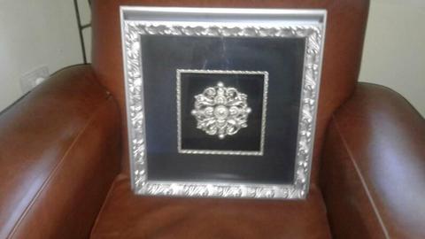 silver / black picture frame with silver motif in the middle