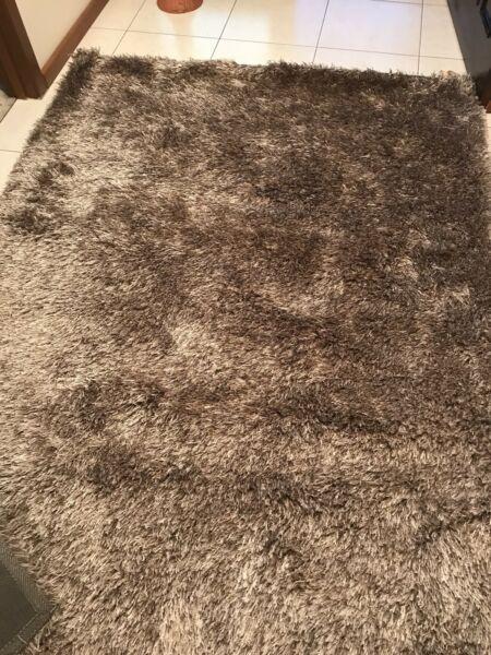 As New - Light Brown Shaggy Rug. 2.3m x 1.6m. RRP $250