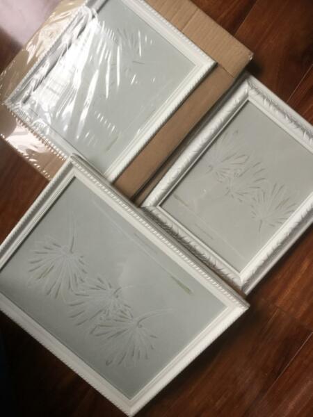 3 cream/white photo frames