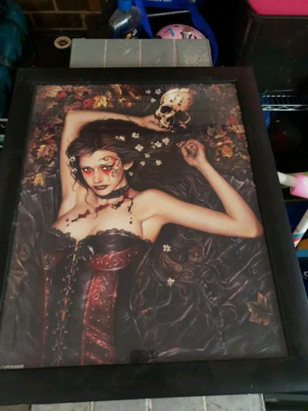 lady and skull picture in frame