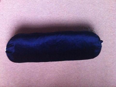 Navy blue cushion roll