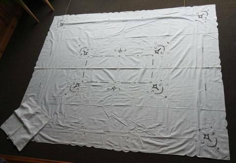 White embroidered table cloth and serviettes