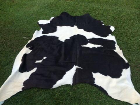 Cow hide rugs floor mats bean bags Ugg boots sheepskins